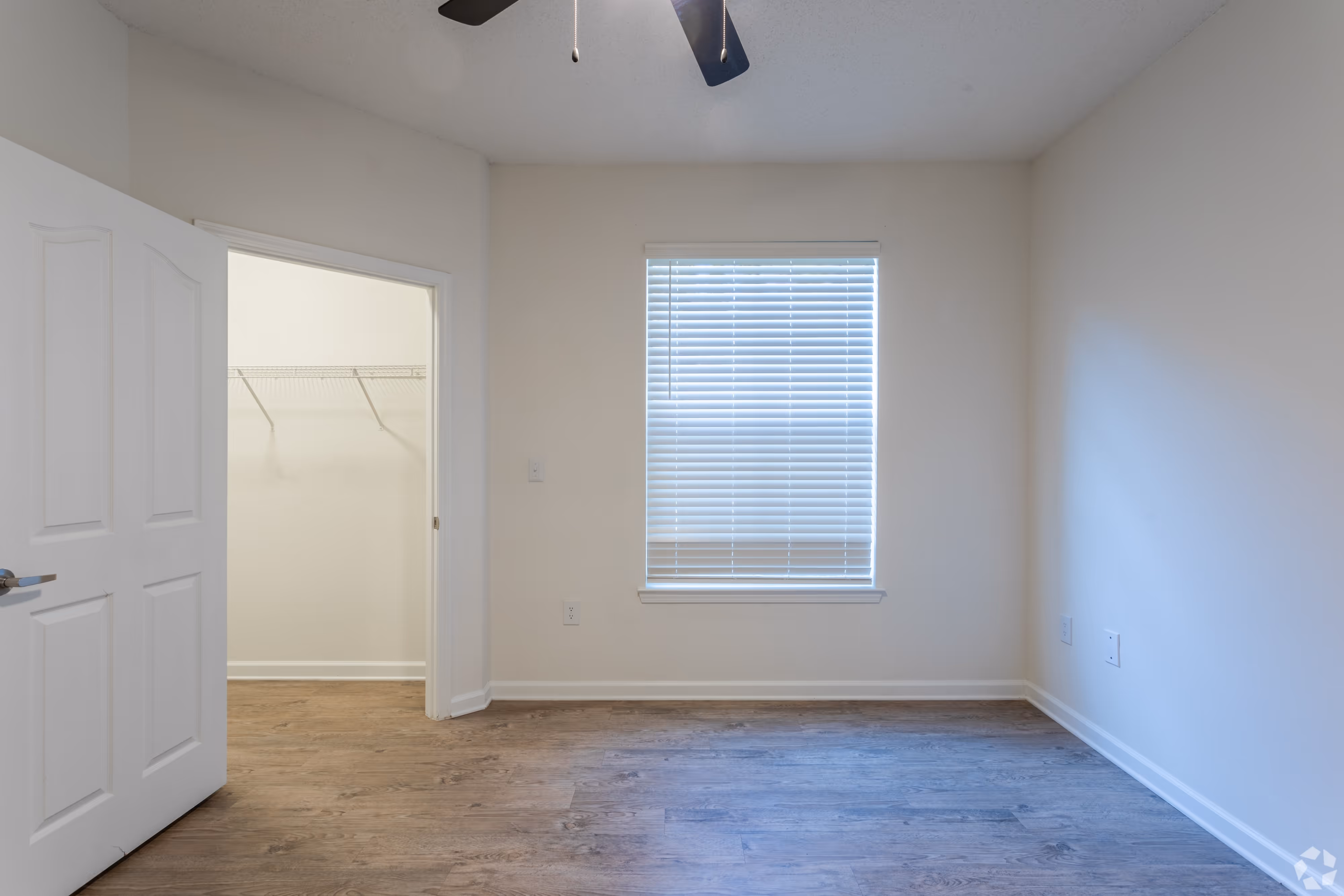 Bedroom with vinyl floors