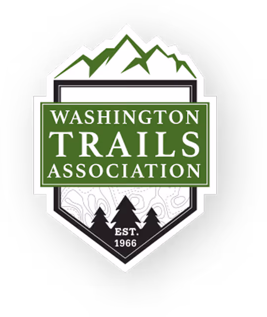 Washington Trails Association logo with stylized green mountains, three black trees, and the text 'Washington Trails Association Est. 1966' on a white and green shield background.