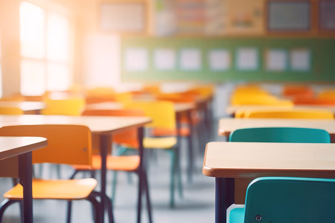 A colorful empty elementary school classroom.