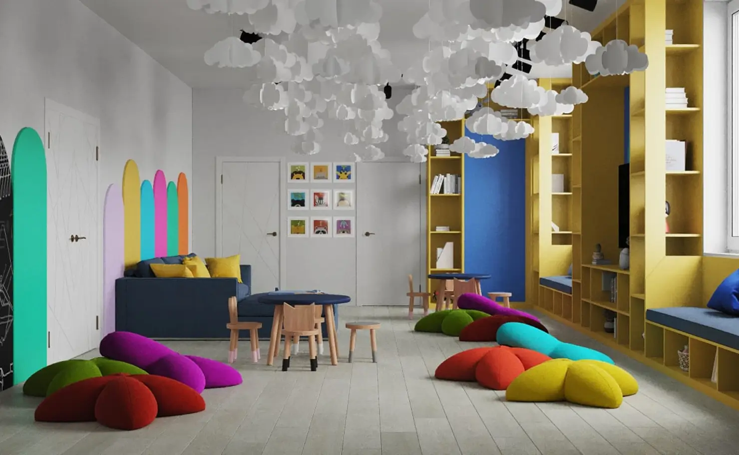 Modern kids playroom with cloud ceiling decor, colorful cushions, wooden tables, and bright yellow shelves.