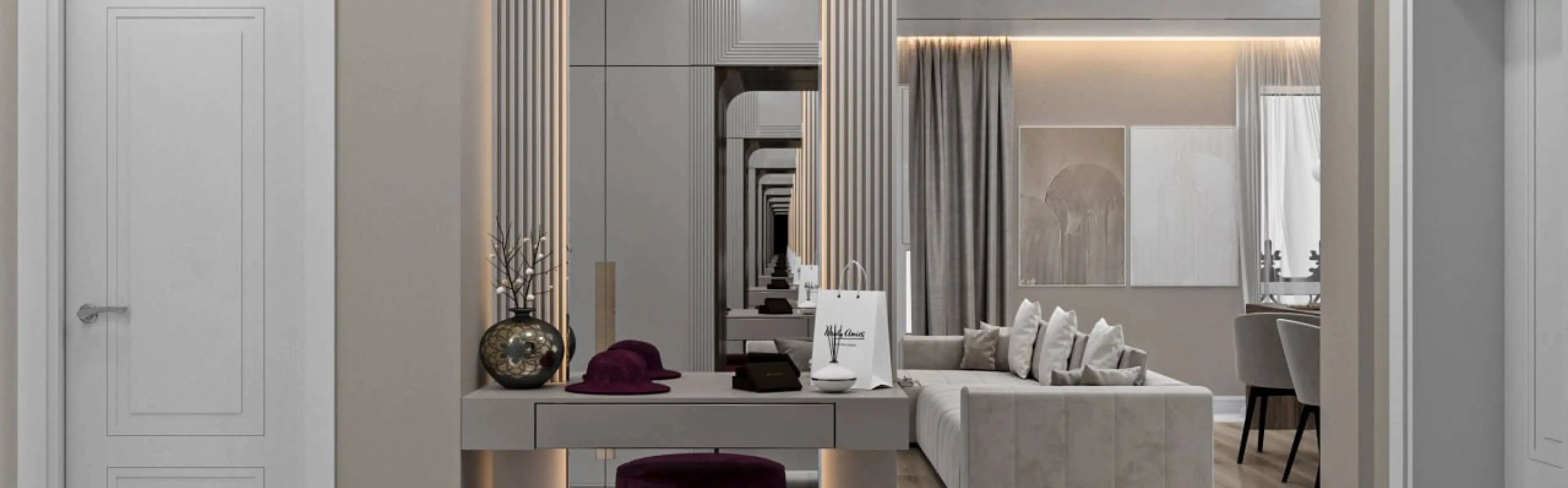 Modern living room with a beige sectional sofa, wall art, a small dining area, and a console table with decorative items.