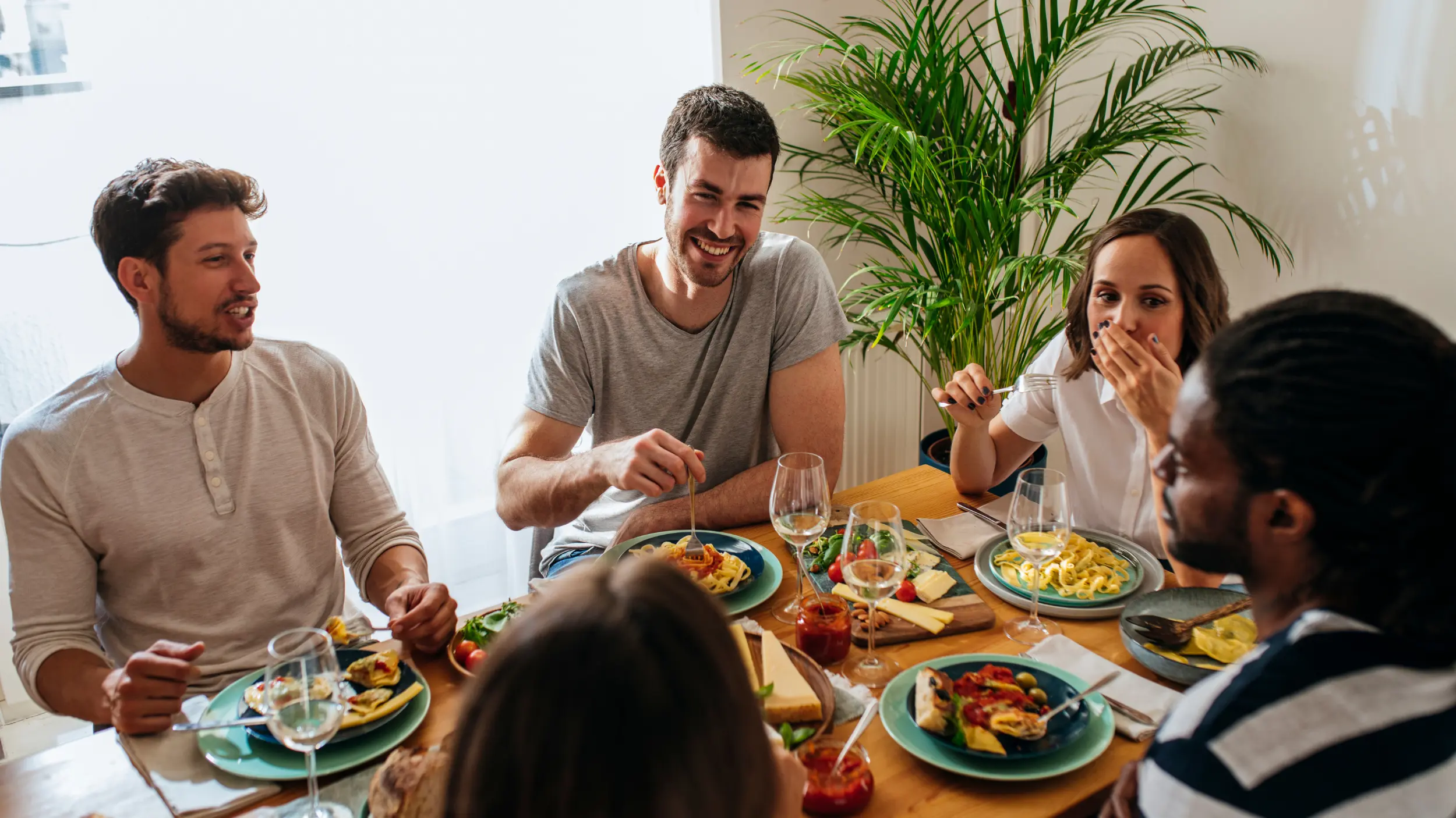 Friends eating dinner blood sugar friendly meal