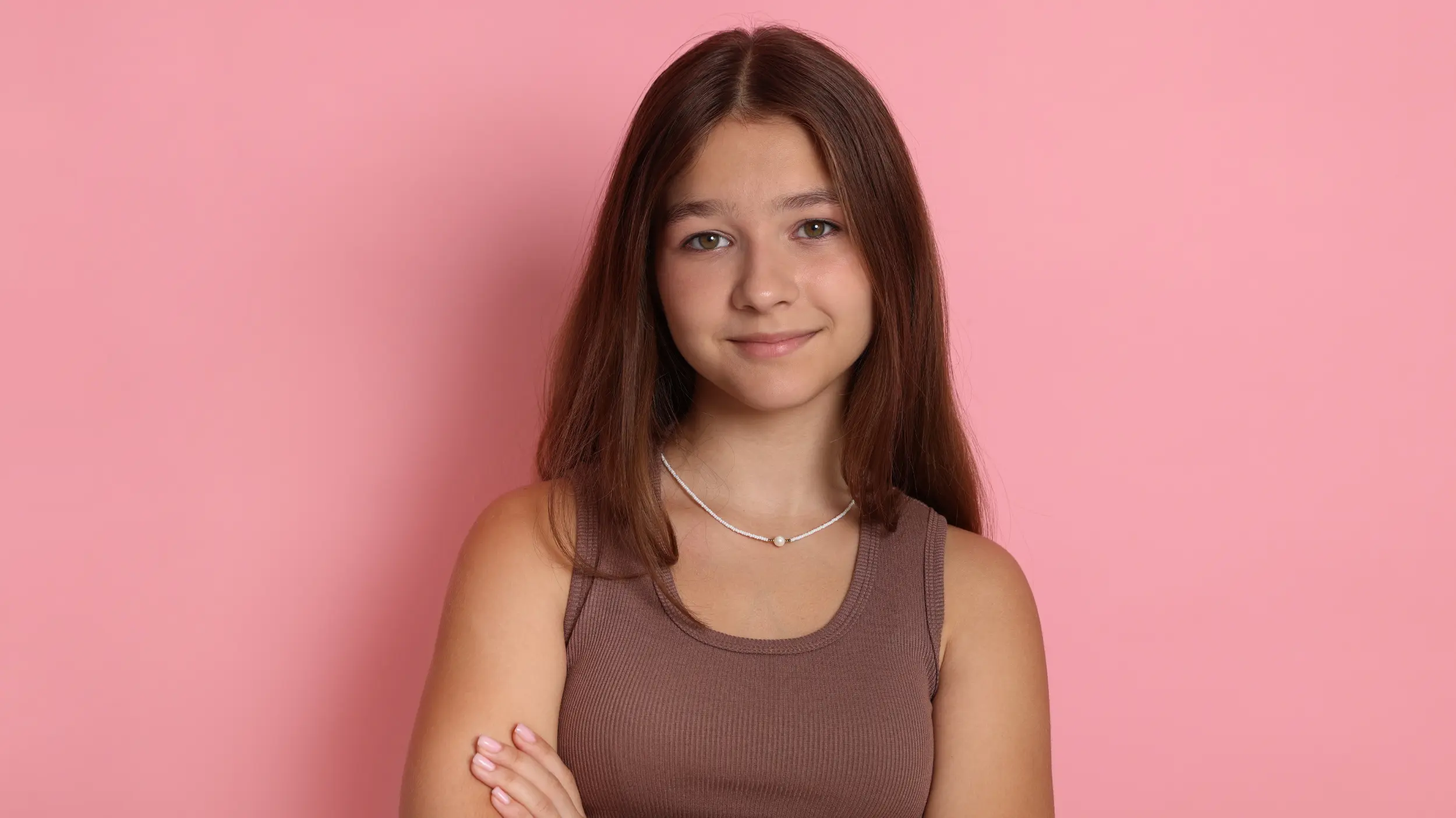 teenage girl with pink background