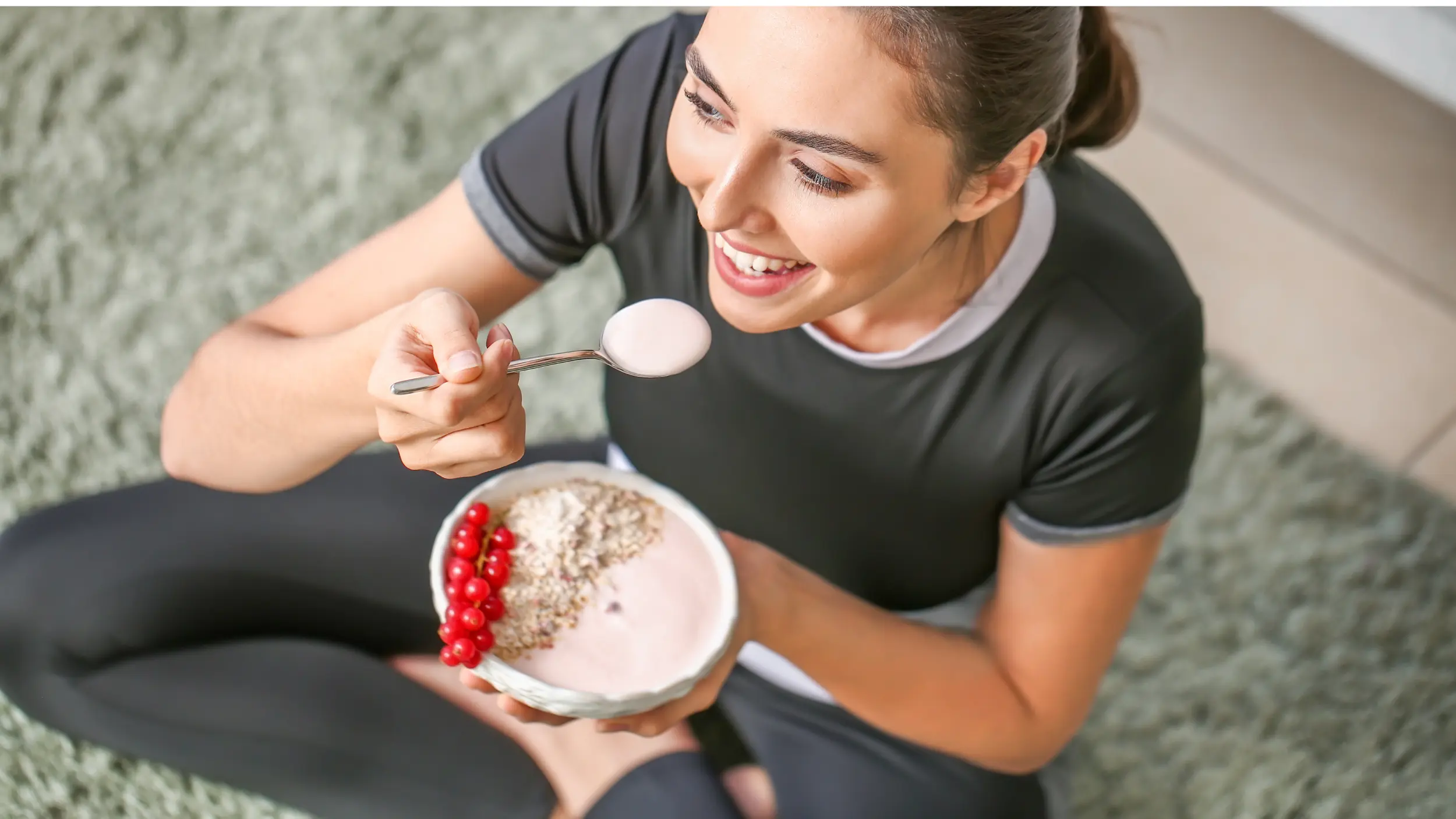 woman with PCOS eating yogurt
