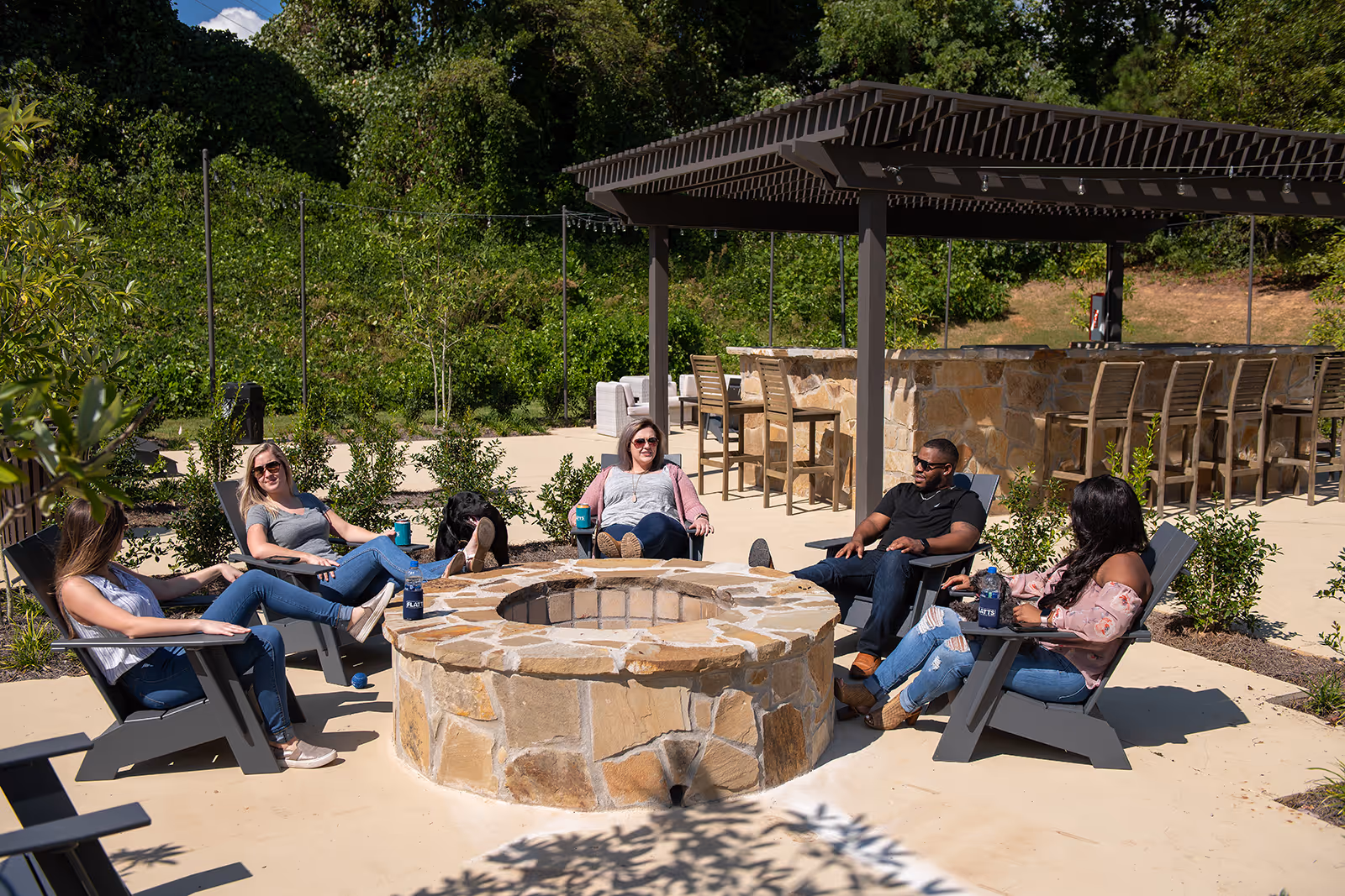 Fire pit in daytime with chairs
