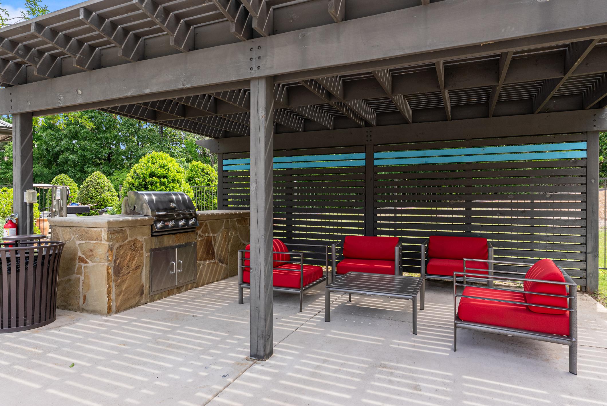 BBQ Gill area featuring stainless steel grill and lounge chairs