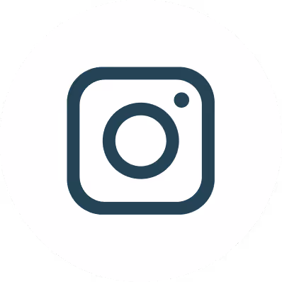Instagram logo in dark blue on a white circular background.