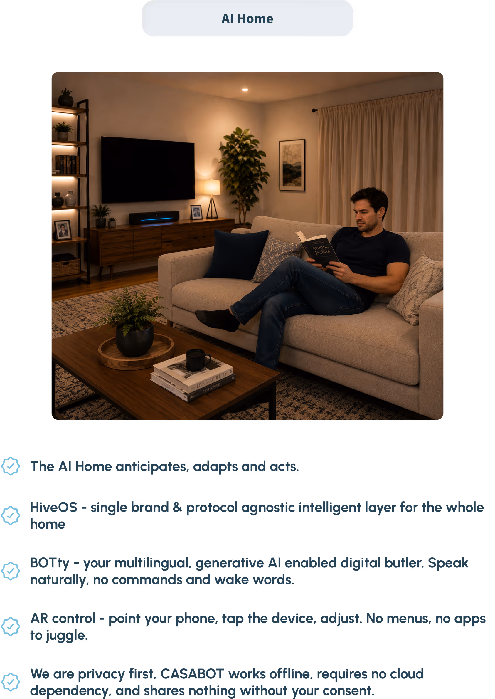 Man reading a book on a beige couch in a cozy living room with a TV, plants, and warm lighting.