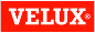 VELUX brand logo in white text on a red rectangular background.
