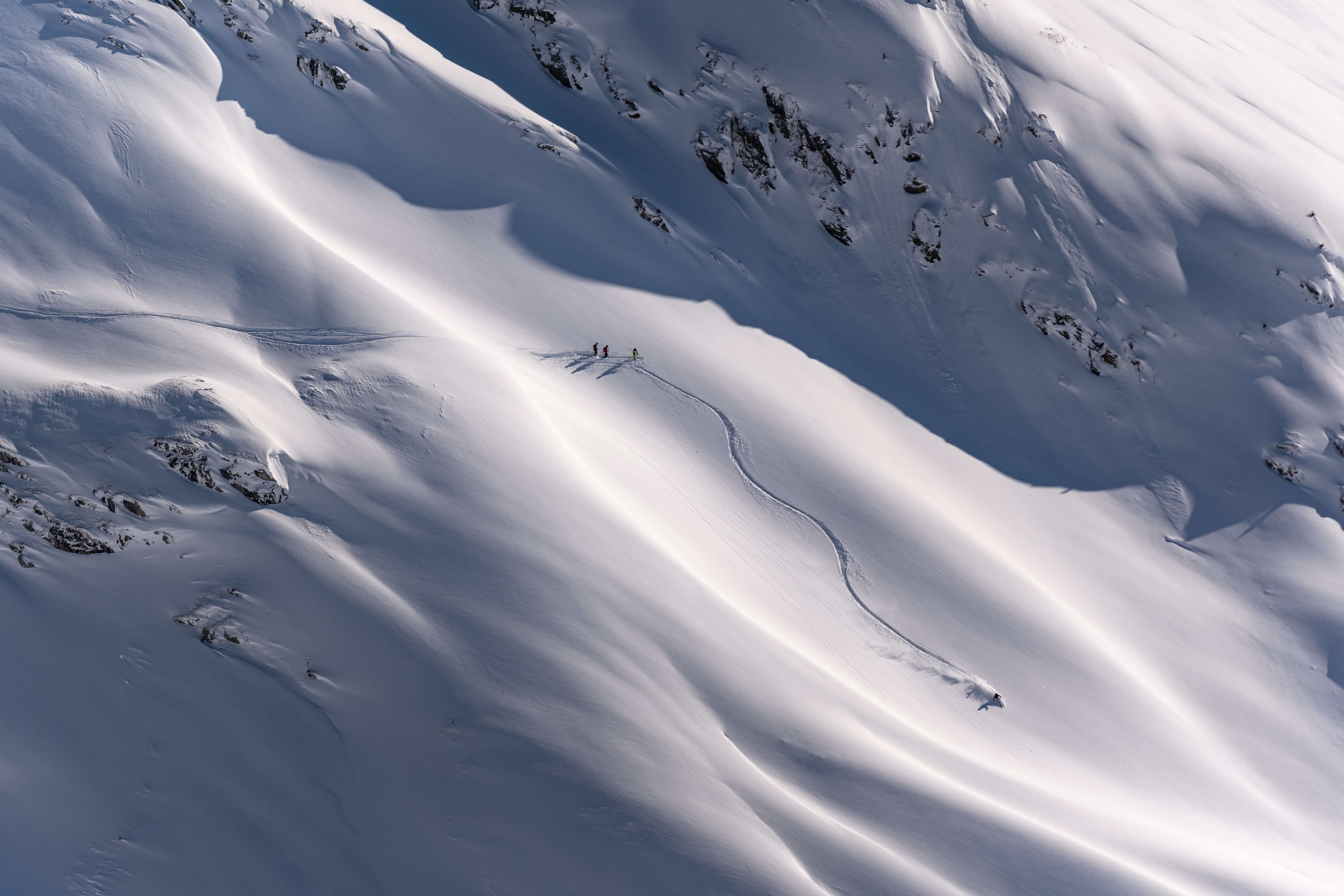 Skier on vast untouched slope