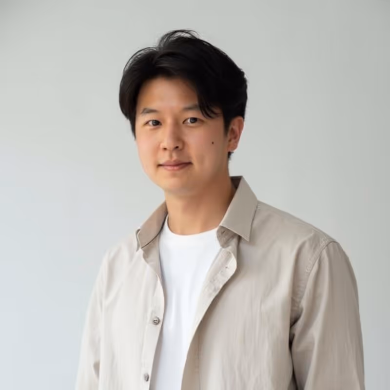 Professional sales man with long black hair in a professional headshot. Wearing a white shirt and beige jacket against a plain background. Previously with Solace, placed with Air. Text overlay reads “Education: Yale, Past Company: Solace.