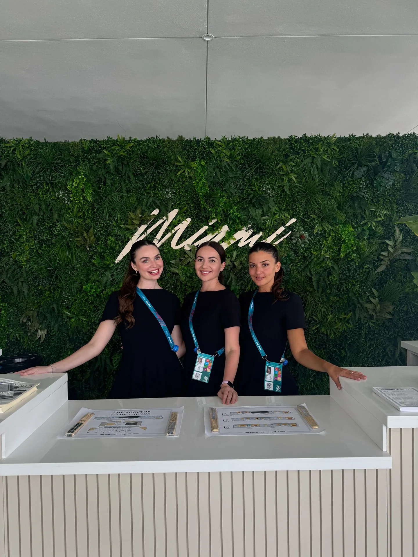 TLC Models hospitality hostesses at the Miami Grand Prix Paddock Club welcome desk