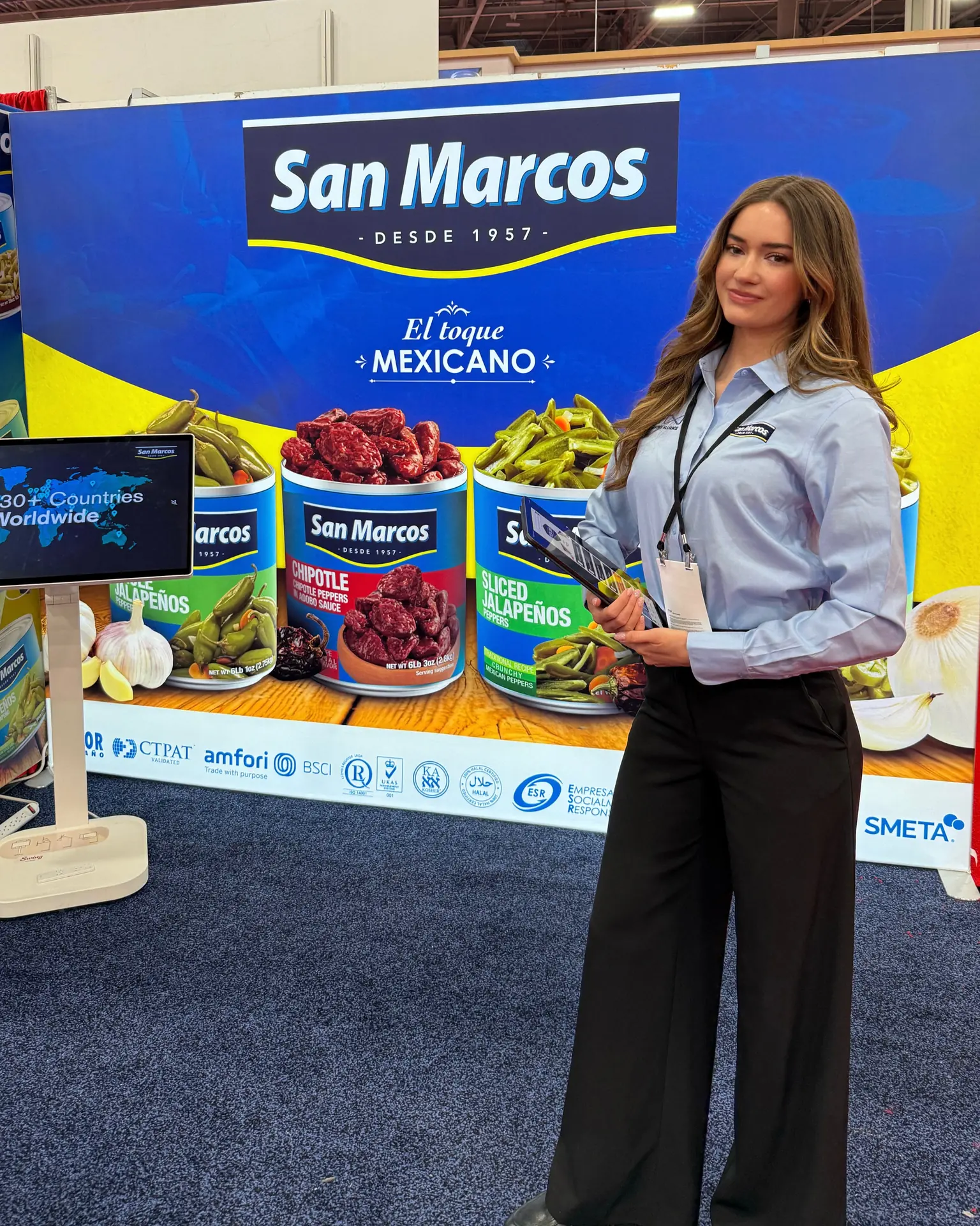 TLC Models brand ambassador at the San Marcos food expo booth