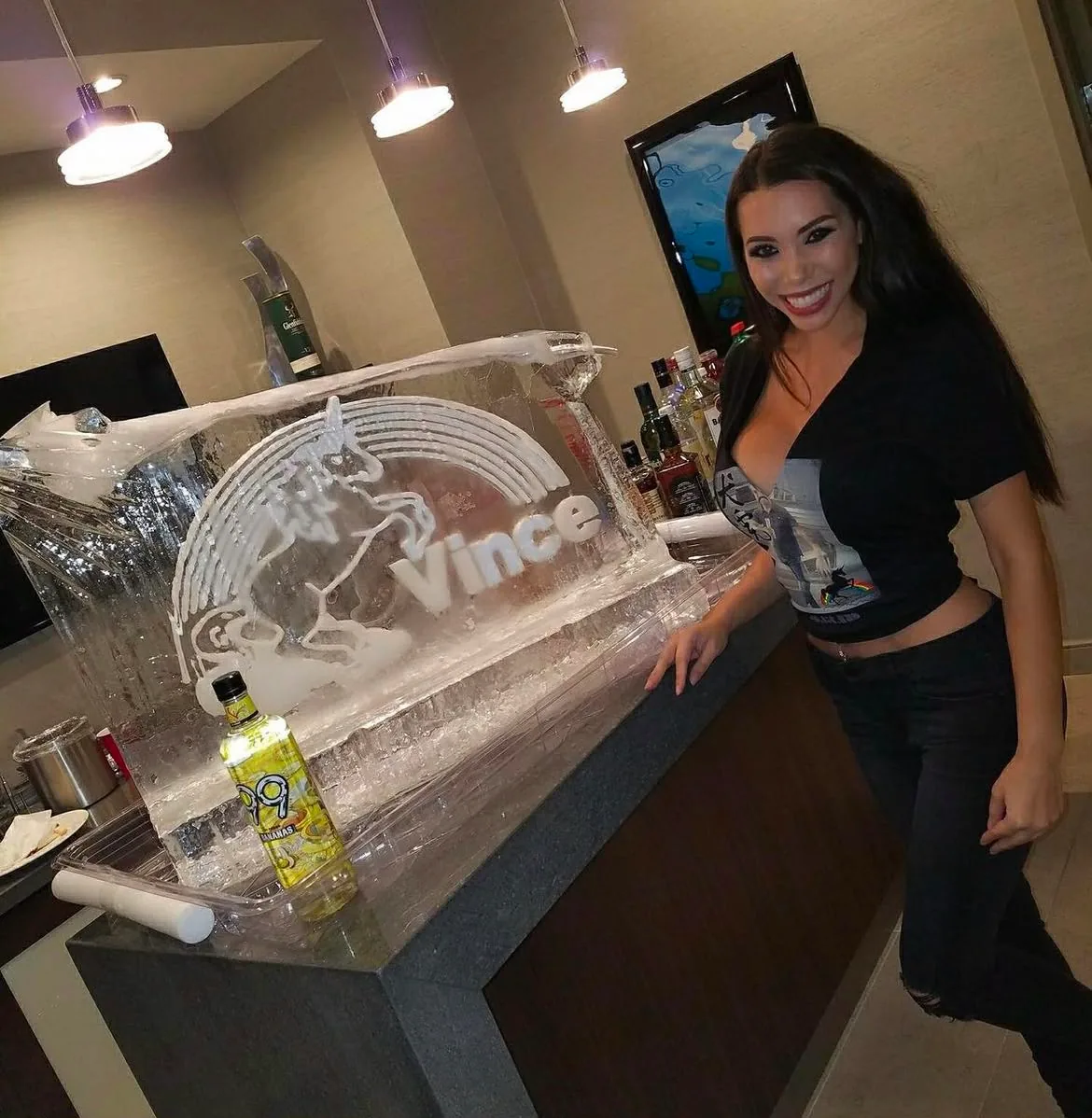 TLC Models event hostess beside a custom ice sculpture bar
