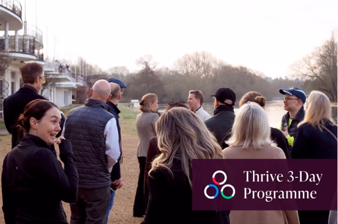 Group of people outdoors near a river on a cloudy day with Thrive 3-Day Programme logo.