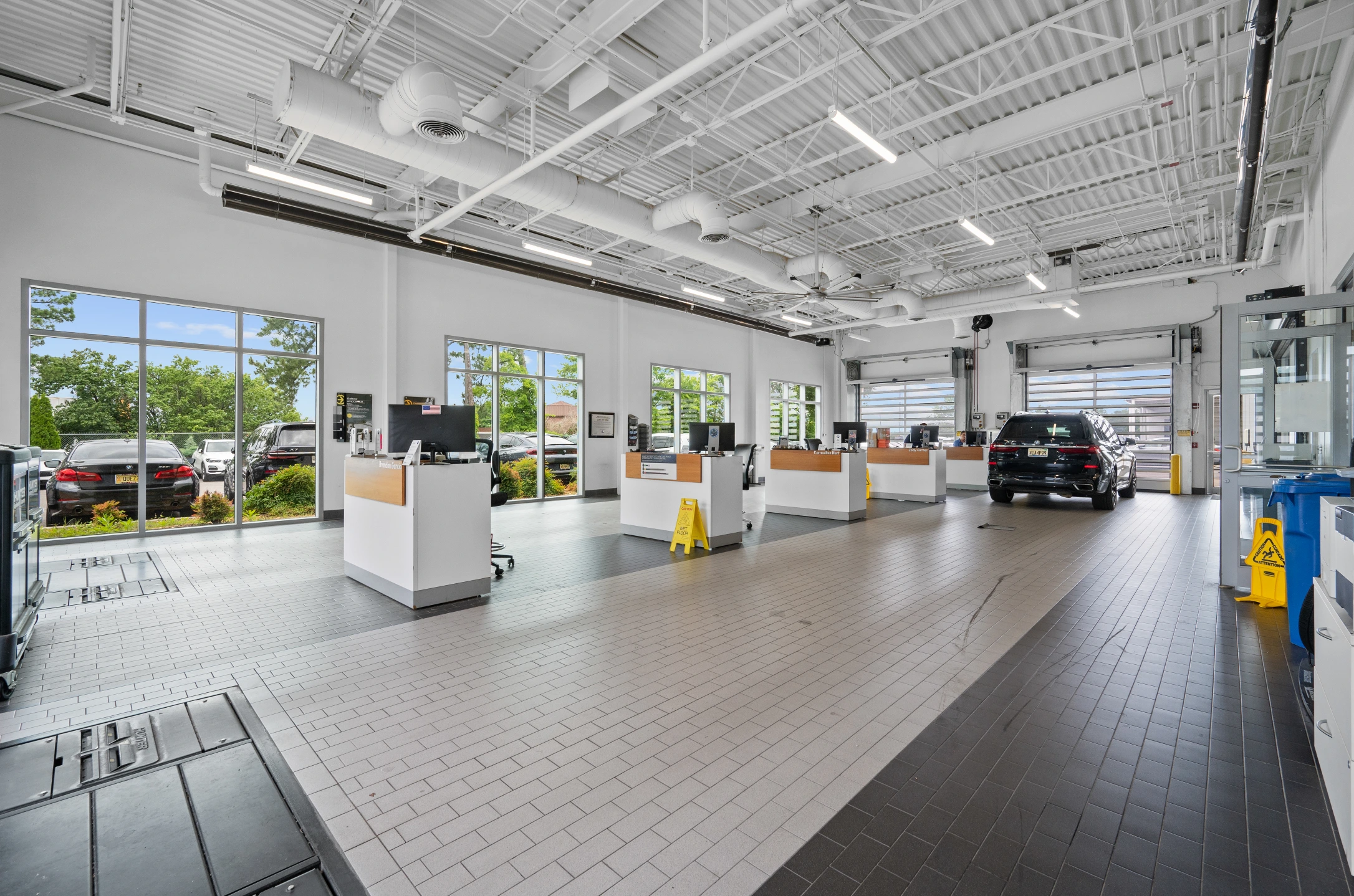Terminals at the check-in center at Century Collision Center.