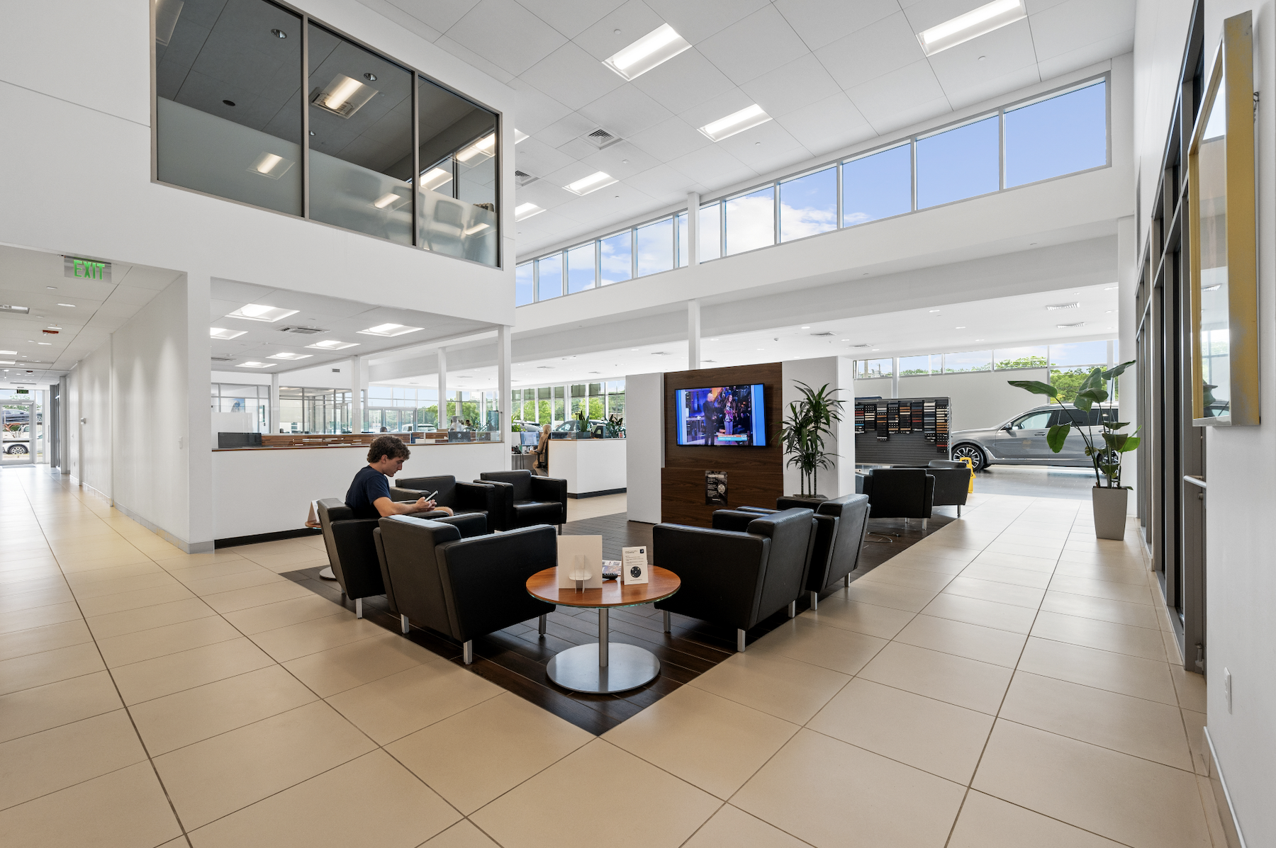 Upscale waiting area inside Century Collision Center.