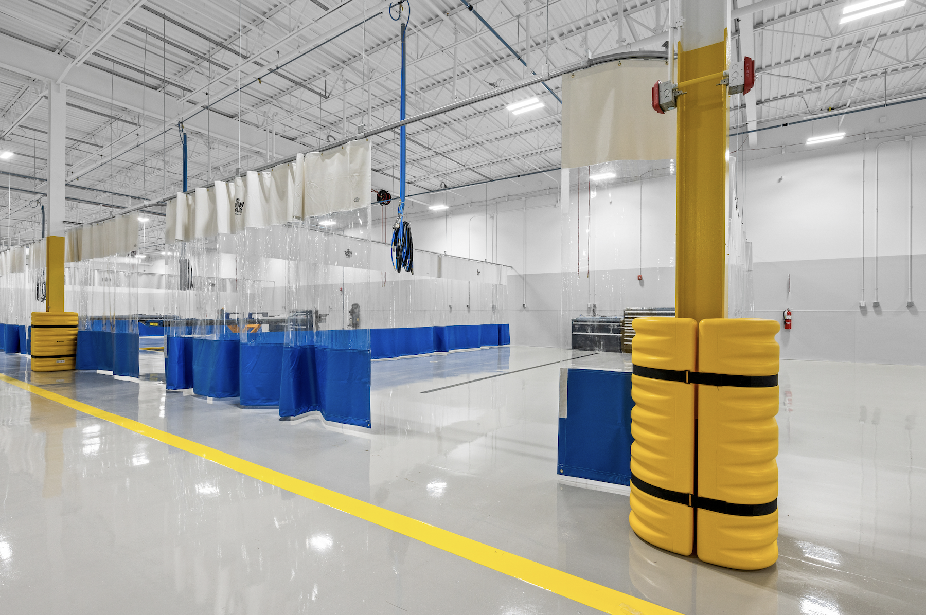 Shop room floor with repair bays at Century Collision Center.