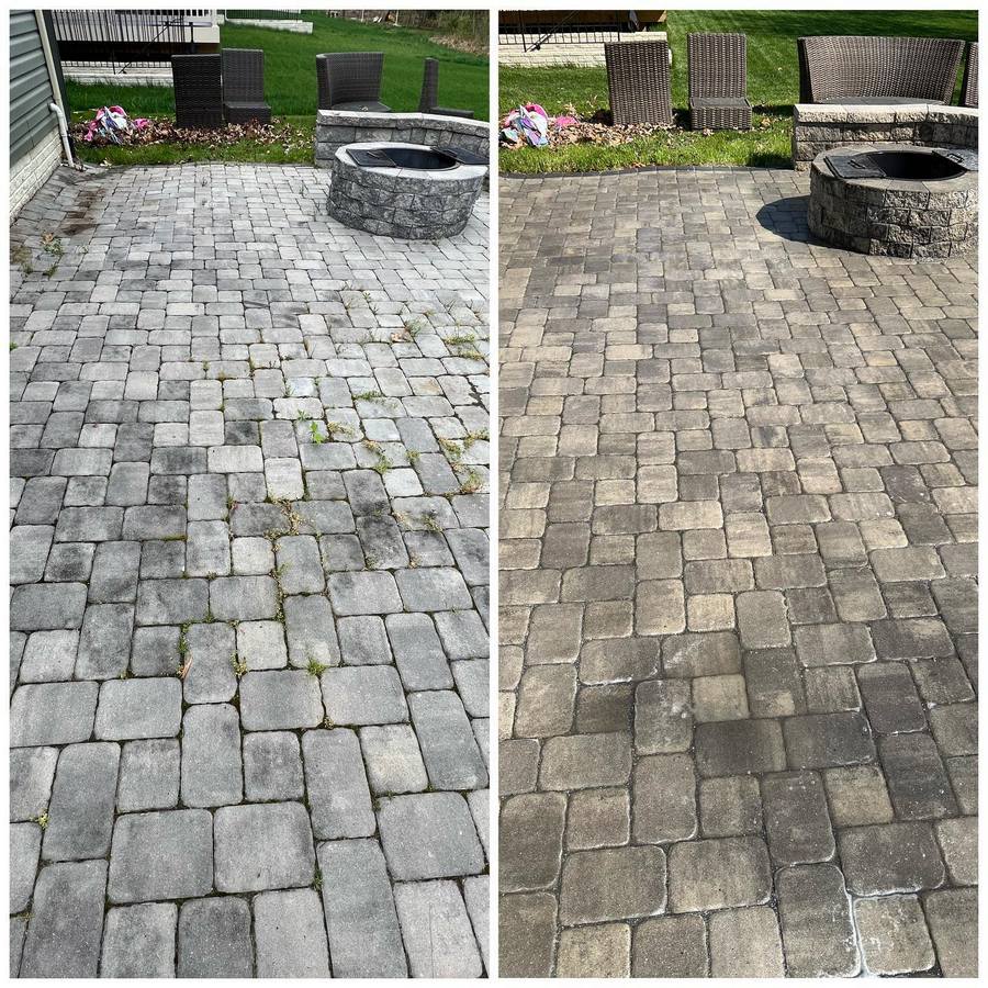 Side-by-side images of a stone patio with a fire pit before and after cleaning, showing gray pavers with weeds and dirt in the before and clean, vibrant pavers in the after.