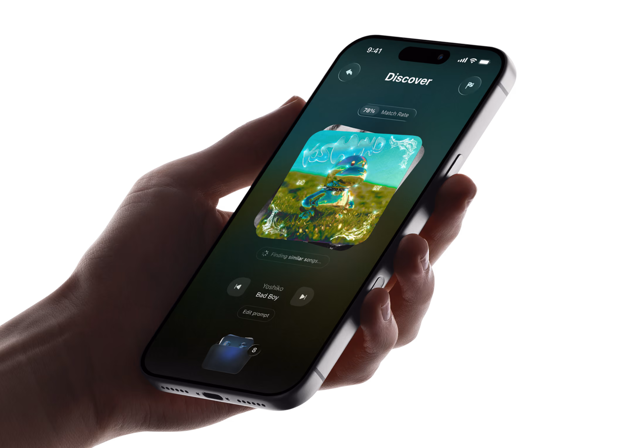 Hand holding a phone showing the music discovery screen