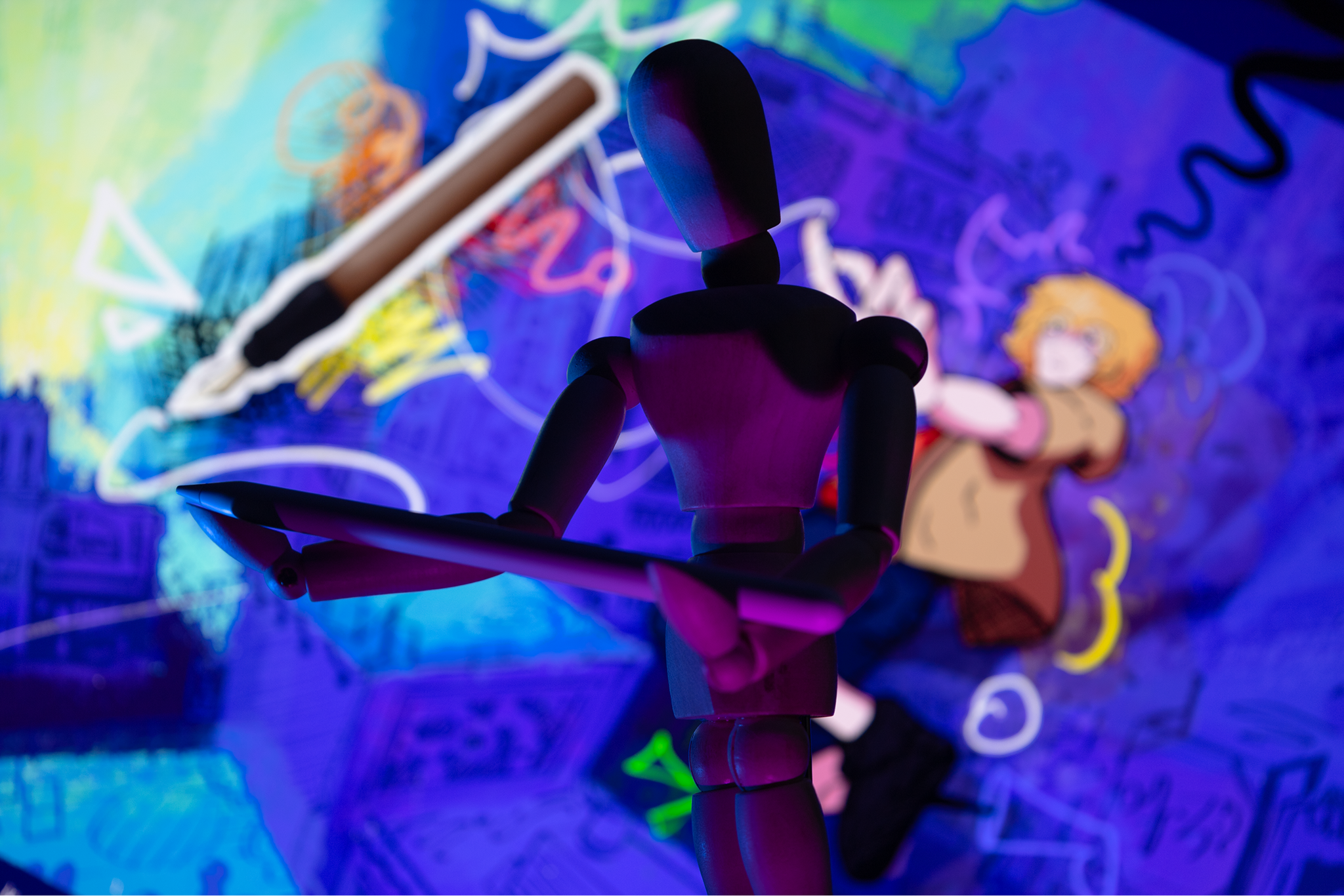 A photograph featuring a drawing manniequin holding a pencil with an purple art work in the background.