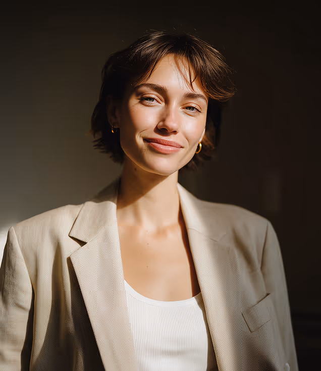 A professionally dressed woman representing trust, expertise, and strong leadership in architectural project management.