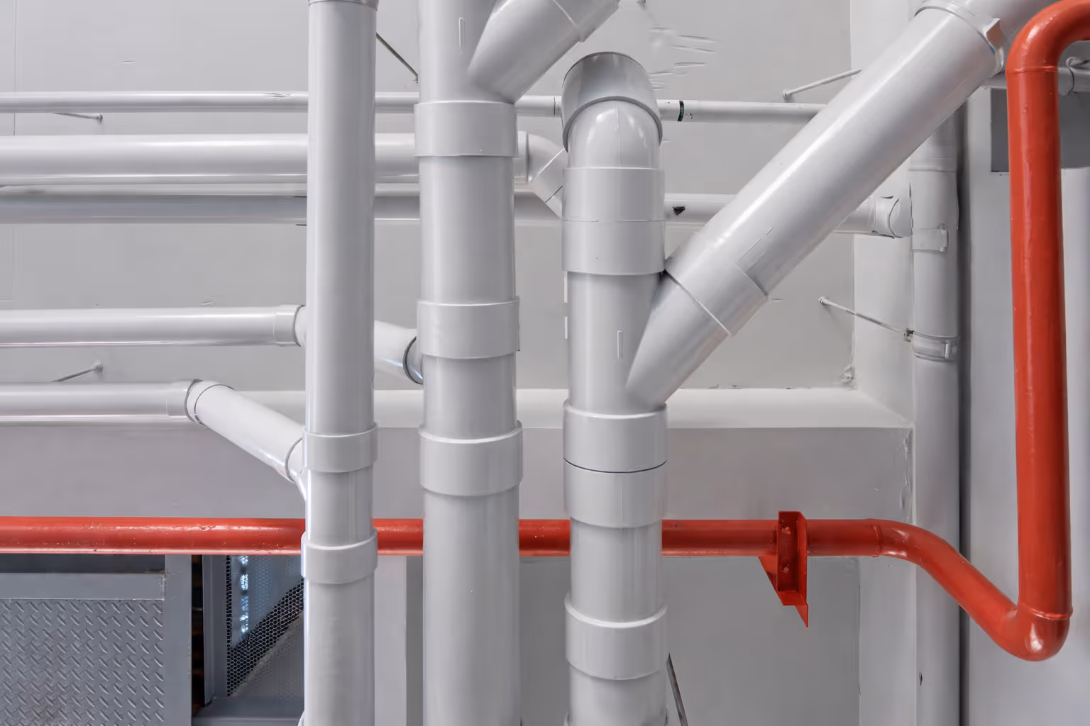Drainage and water supply piping systems installed for efficient plumbing, wastewater management, and utility infrastructure in commercial buildings.