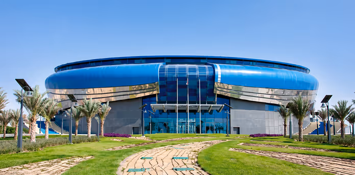 Large-scale sports facility with specialized engineering and infrastructure solutions designed for high-performance operations, safety compliance, durability, and continuous use in dynamic environments
