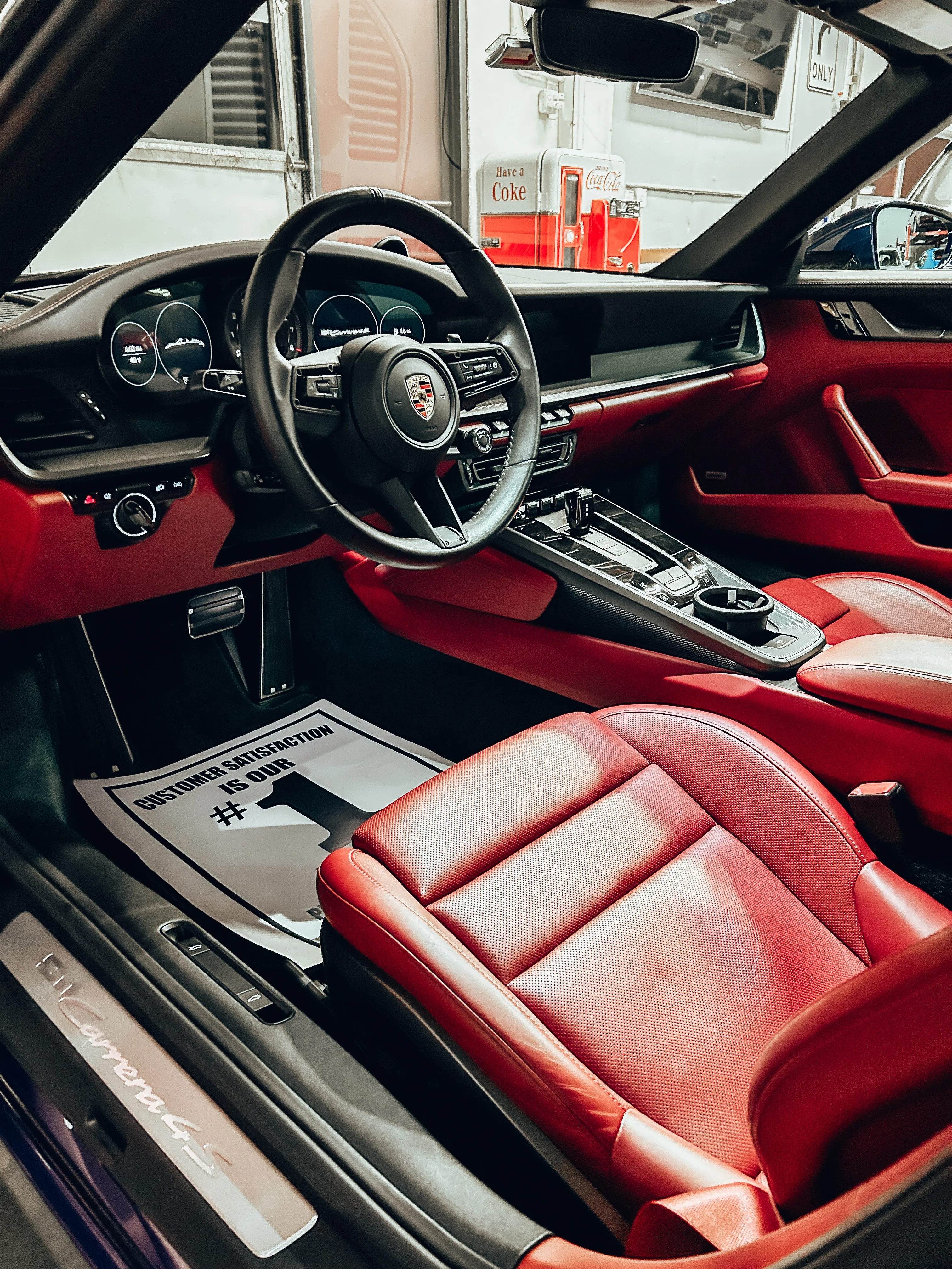 Red leather interior of a Porsche 911 Carrera 4S after an interior detail, Auburn WA