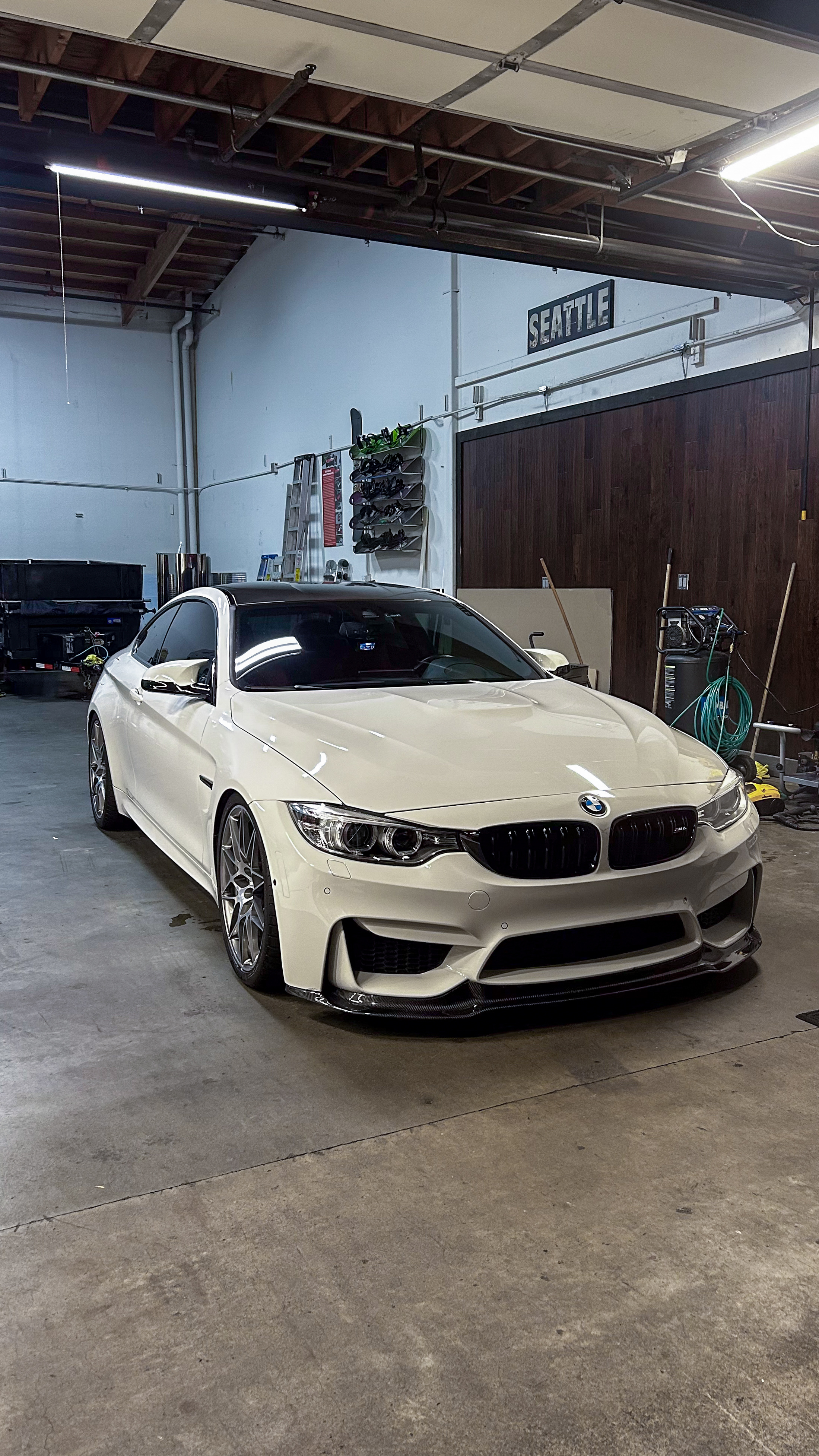 image of mechanics at work on a car