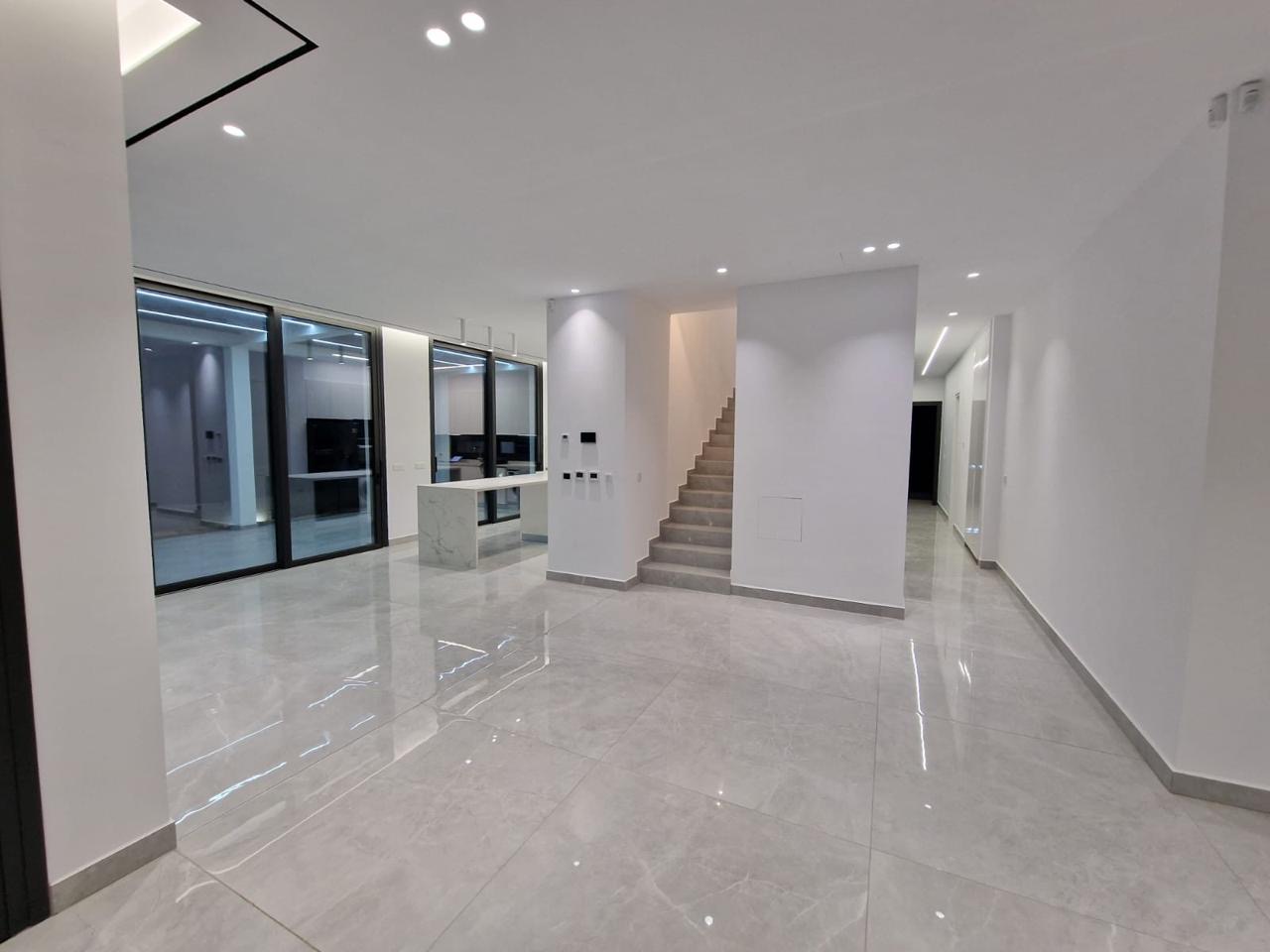 Living area and staircase in the completed Sea Caves villa, Peyia, Paphos