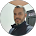 Man in circular cropped photo wearing a headset, representing MBPS managed IT support team member in Phoenix