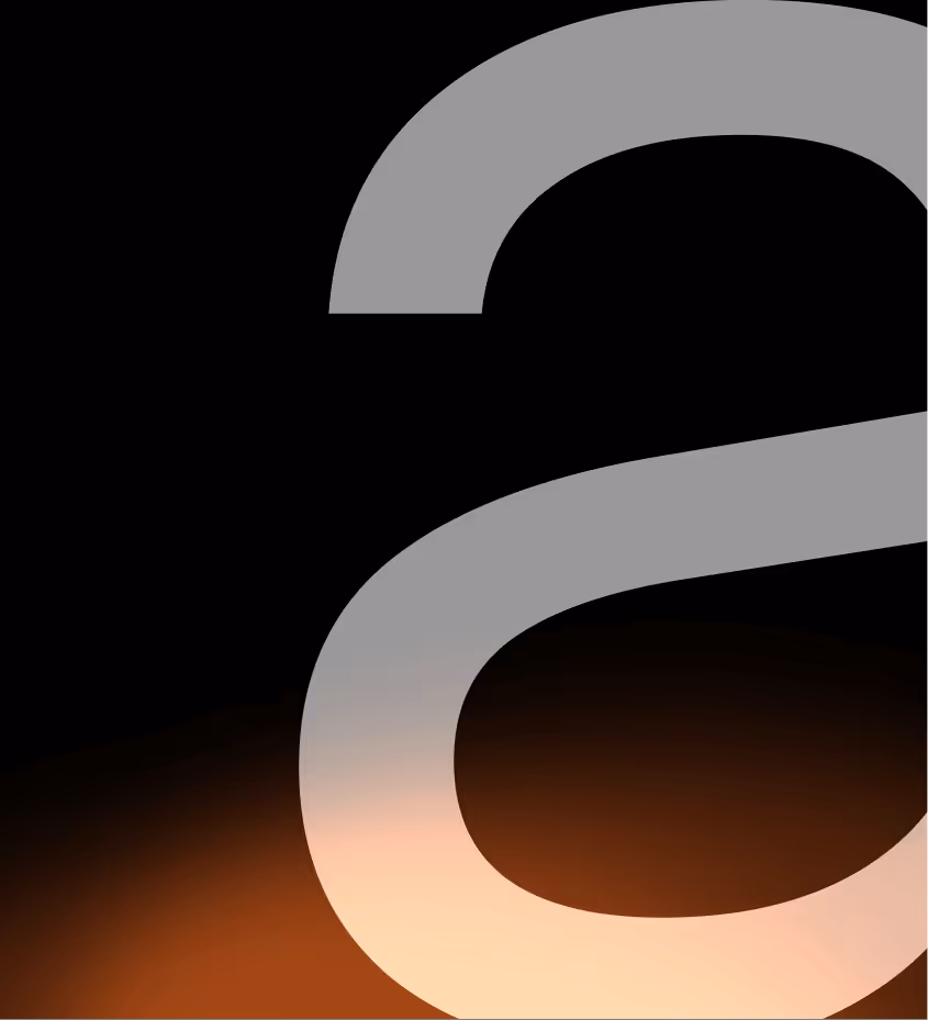 Large, stylized gray lowercase letter 'a' on a black background with an orange gradient at the bottom.