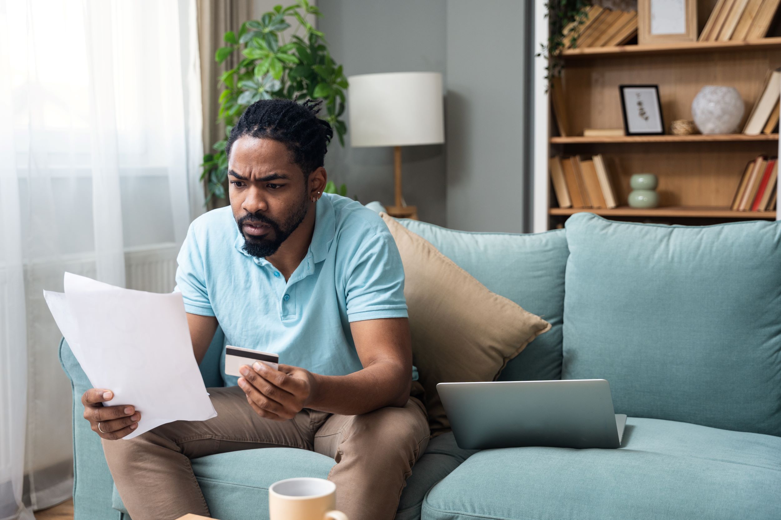 Stressed taxpayer looking at documents