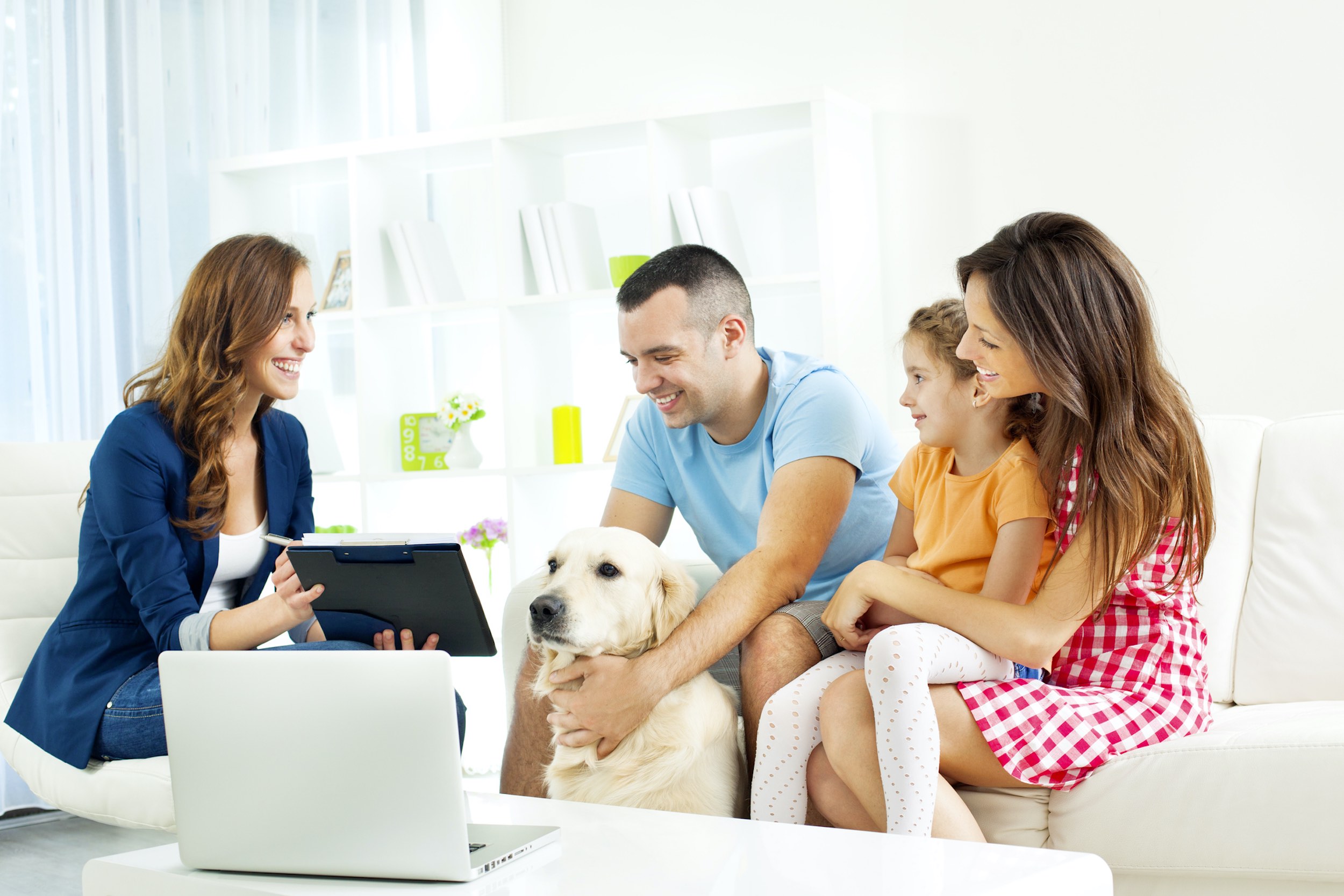 Family reviewing financial documents with an advisor