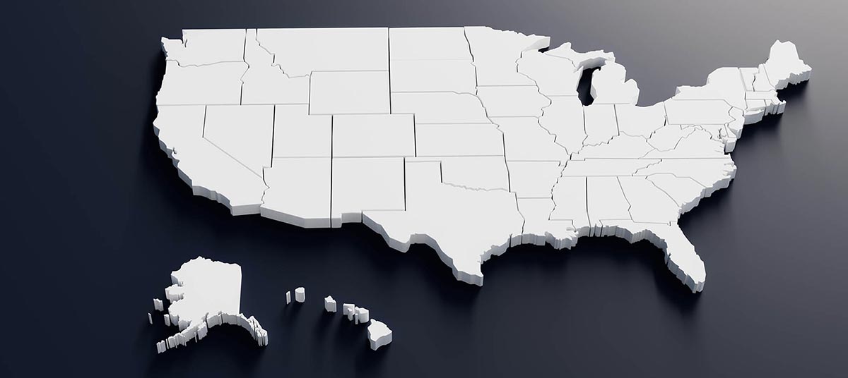 Office desk with financial documents and laptop