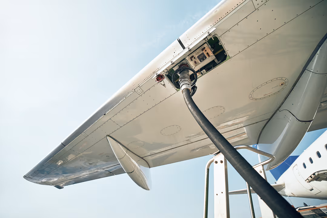 a jet fueling up a plane