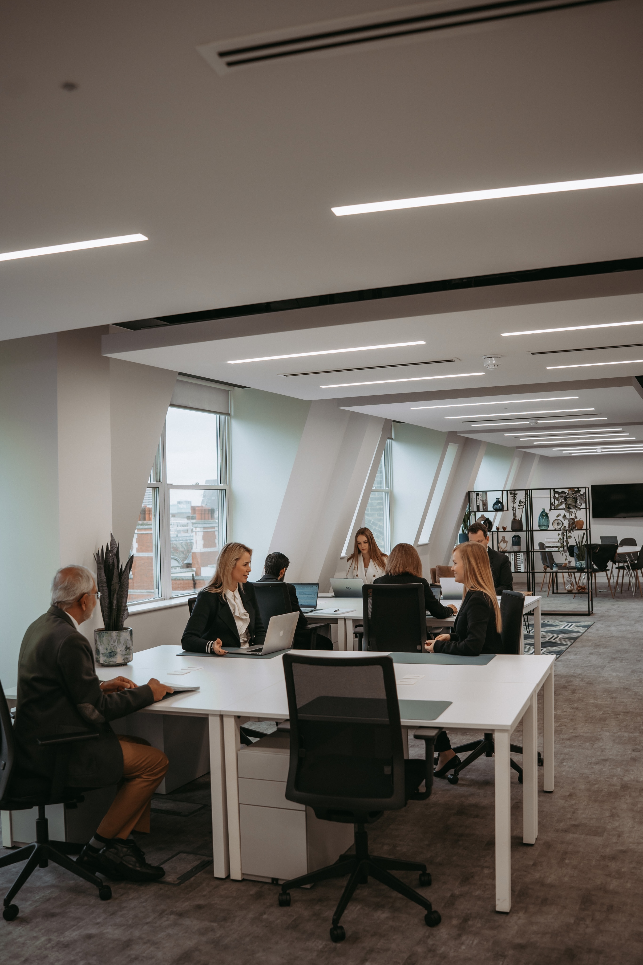Lawyer London team around a meeting table in the office