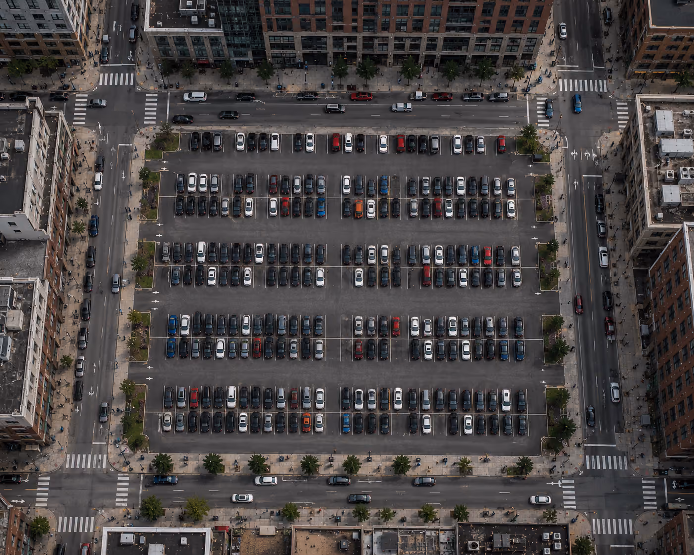 Aerial view of a parking lot in the middle of downtown