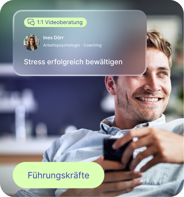 Smiling man holding a smartphone with overlay text about 1:1 video coaching for managing stress by psychologist Ines Dörr.