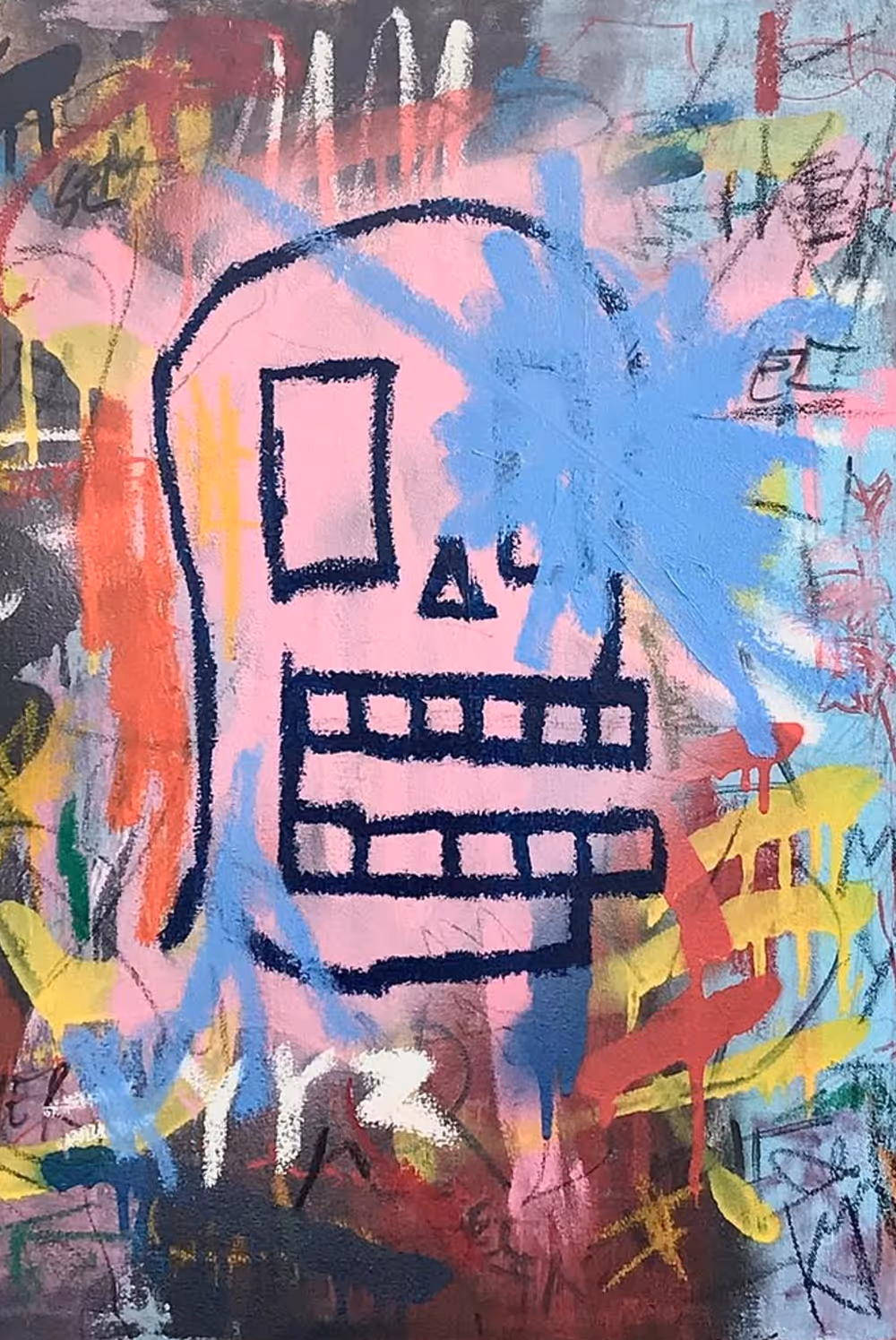 Colorful graffiti art of a stylized skull with geometric features on a wall.