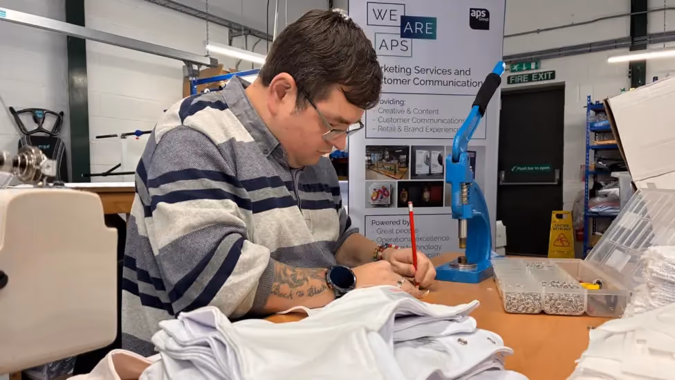 ELITE Supported Employment participant developing practical workplace skills in a workshop.
