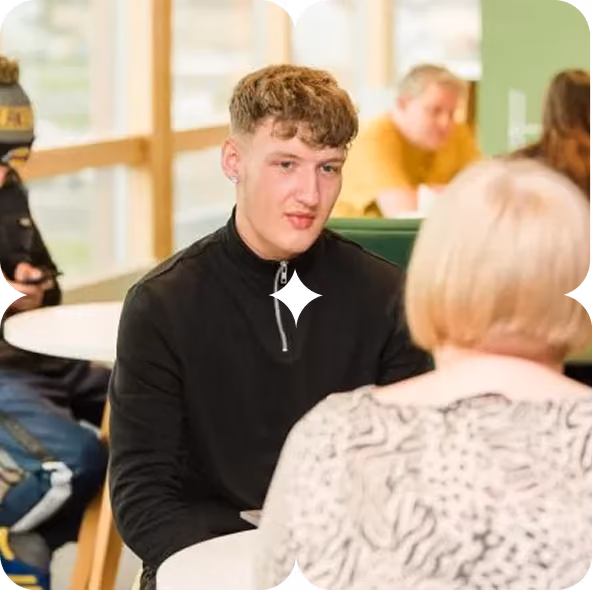 Young person discussing employment and training opportunities with a Fedcap UK adviser.