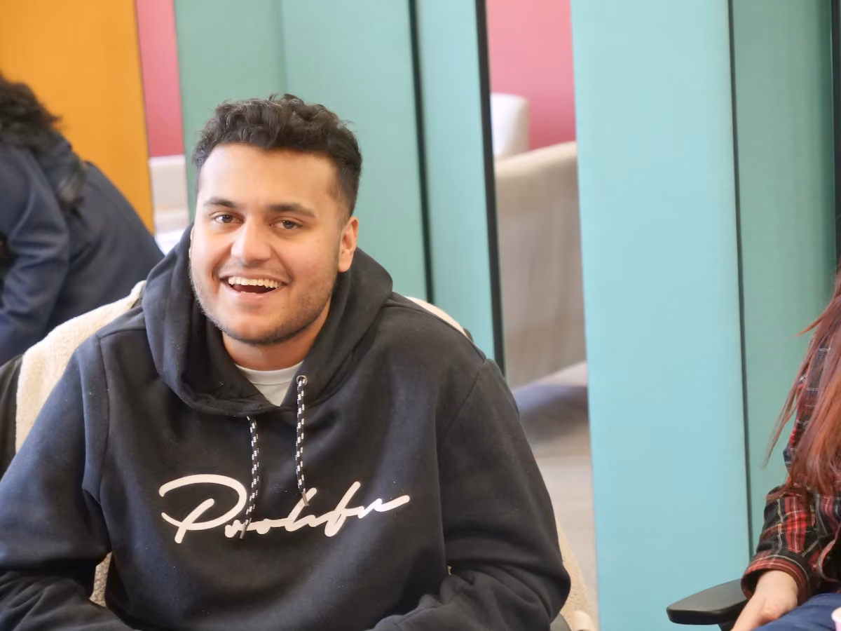 Young man taking part in a community-based support programme.