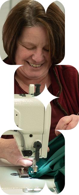 Woman developing vocational skills while working at an industrial sewing machine.
