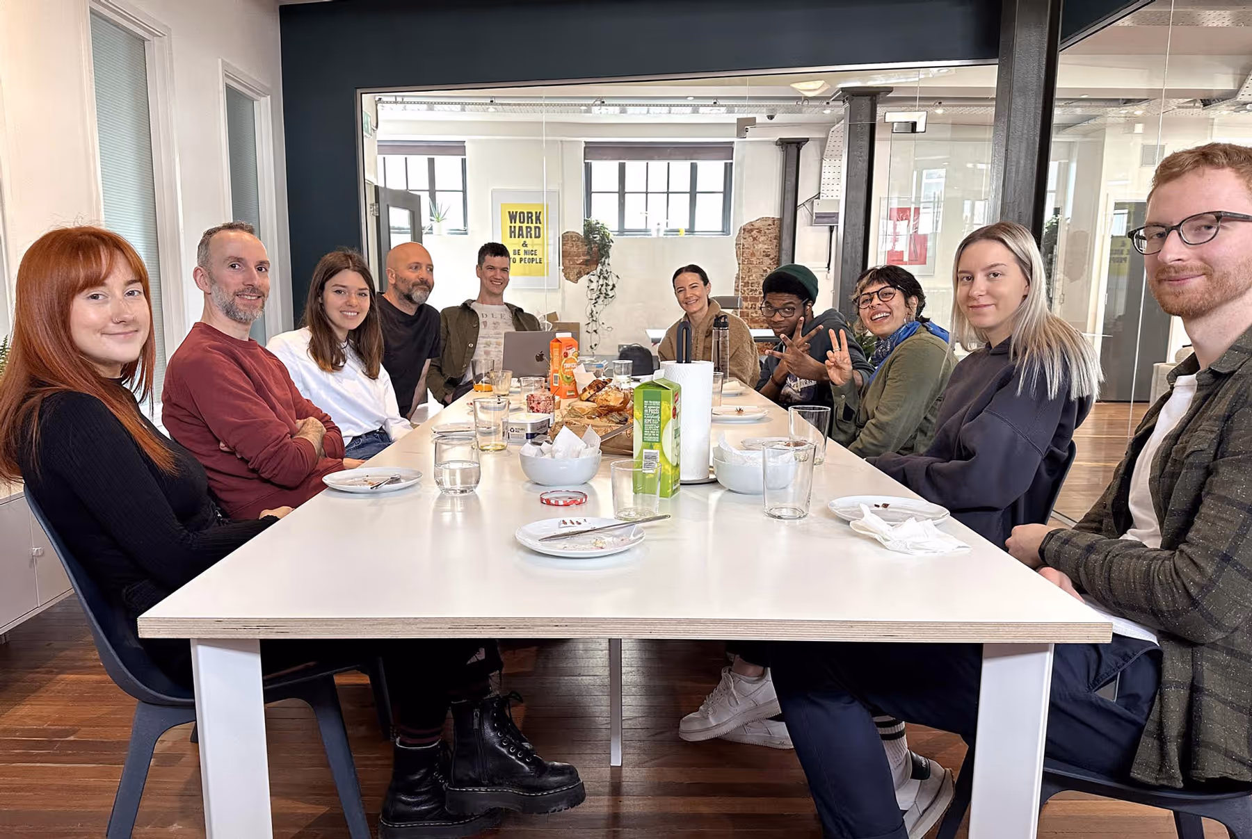 The team sat around the meeting table 