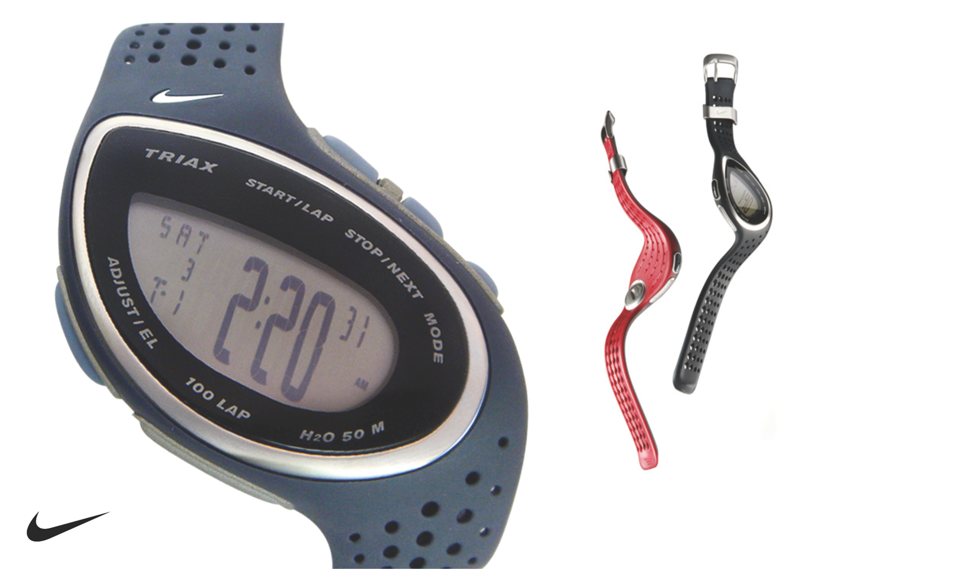 Digital Nike Triax sports wristwatch displaying time 2:20 with perforated rubber strap in black and red colors.