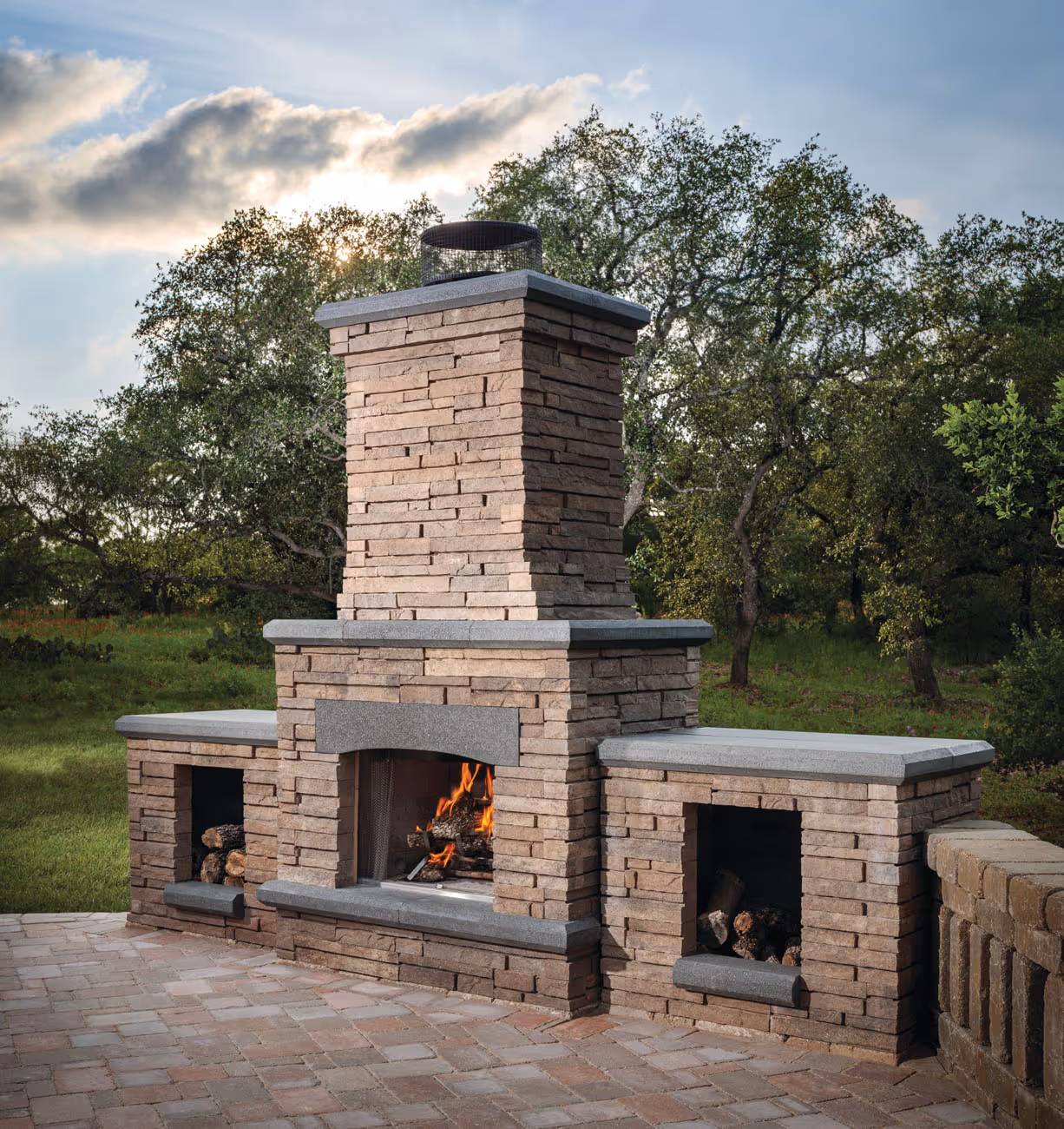 Belgard fireplace installation with main chimney and side compartments