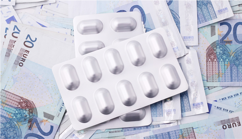 Two blister packs of pills placed on scattered 20 euro banknotes.