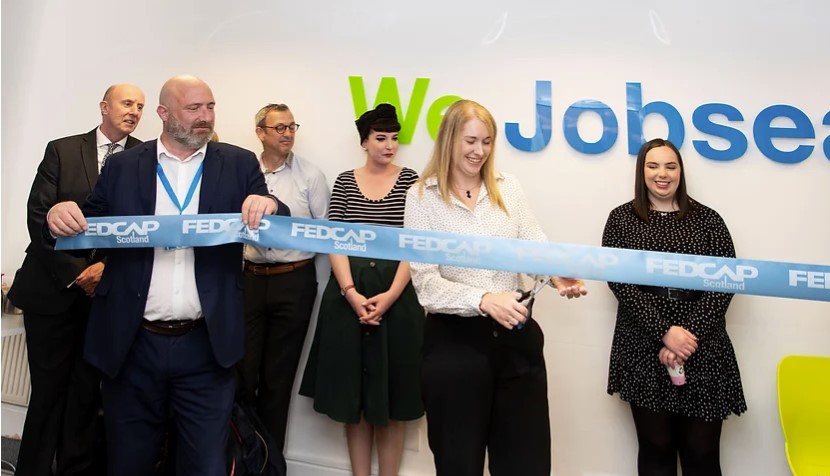Ribbon cutting at new Edinburgh office